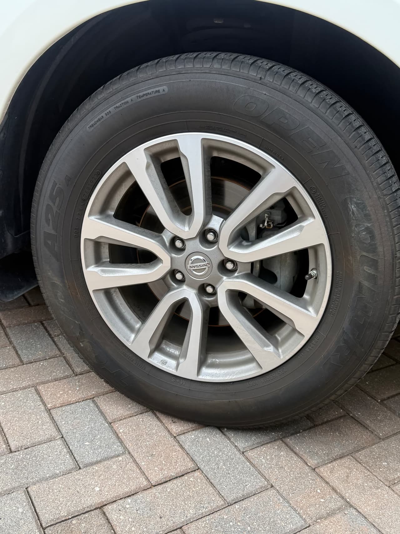 Wheel and tire before cleaning during a mobile detail in Kissimmee, FL