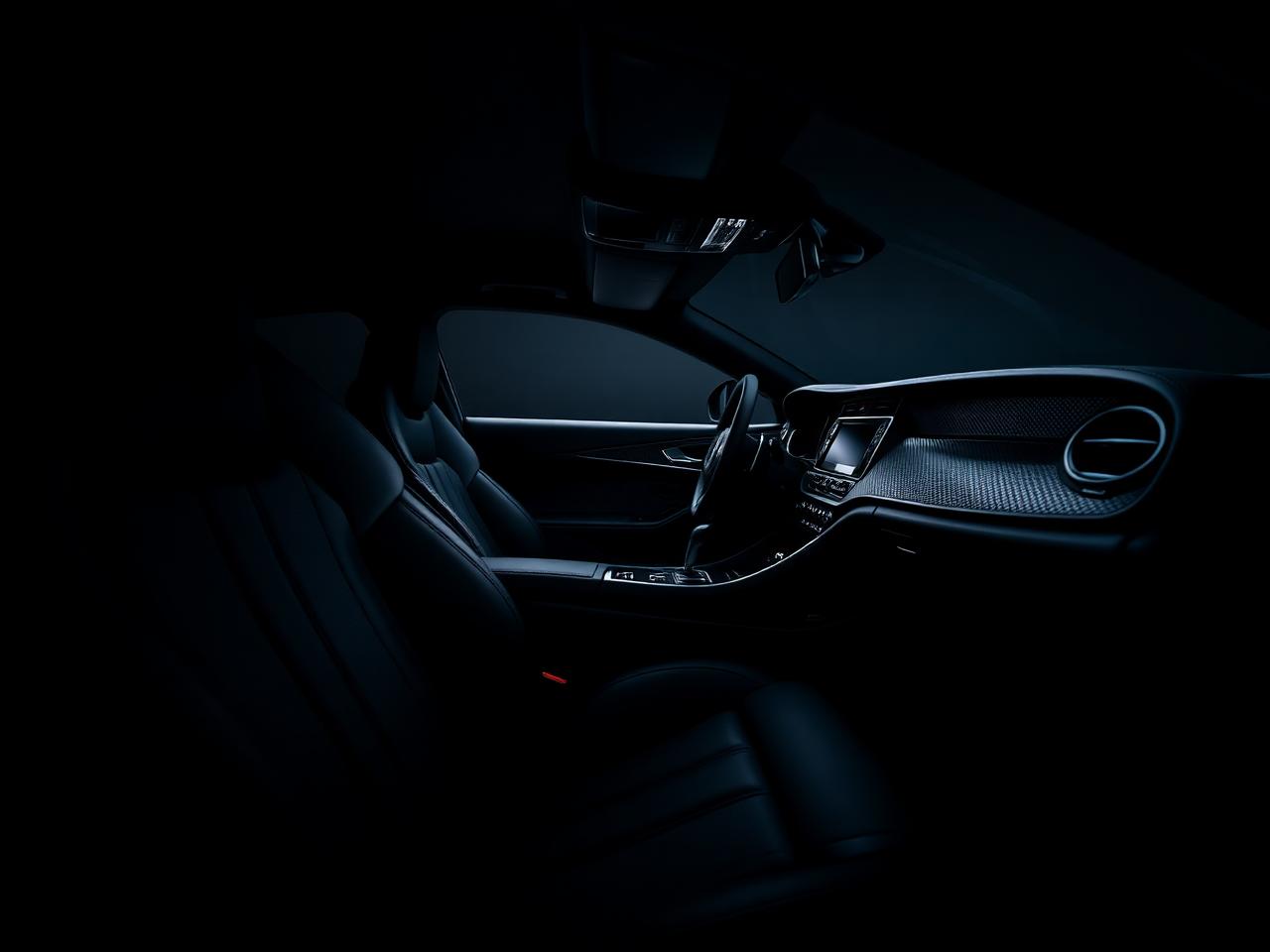 Clean black leather seats and dashboard after mobile interior car detailing in Kissimmee, FL